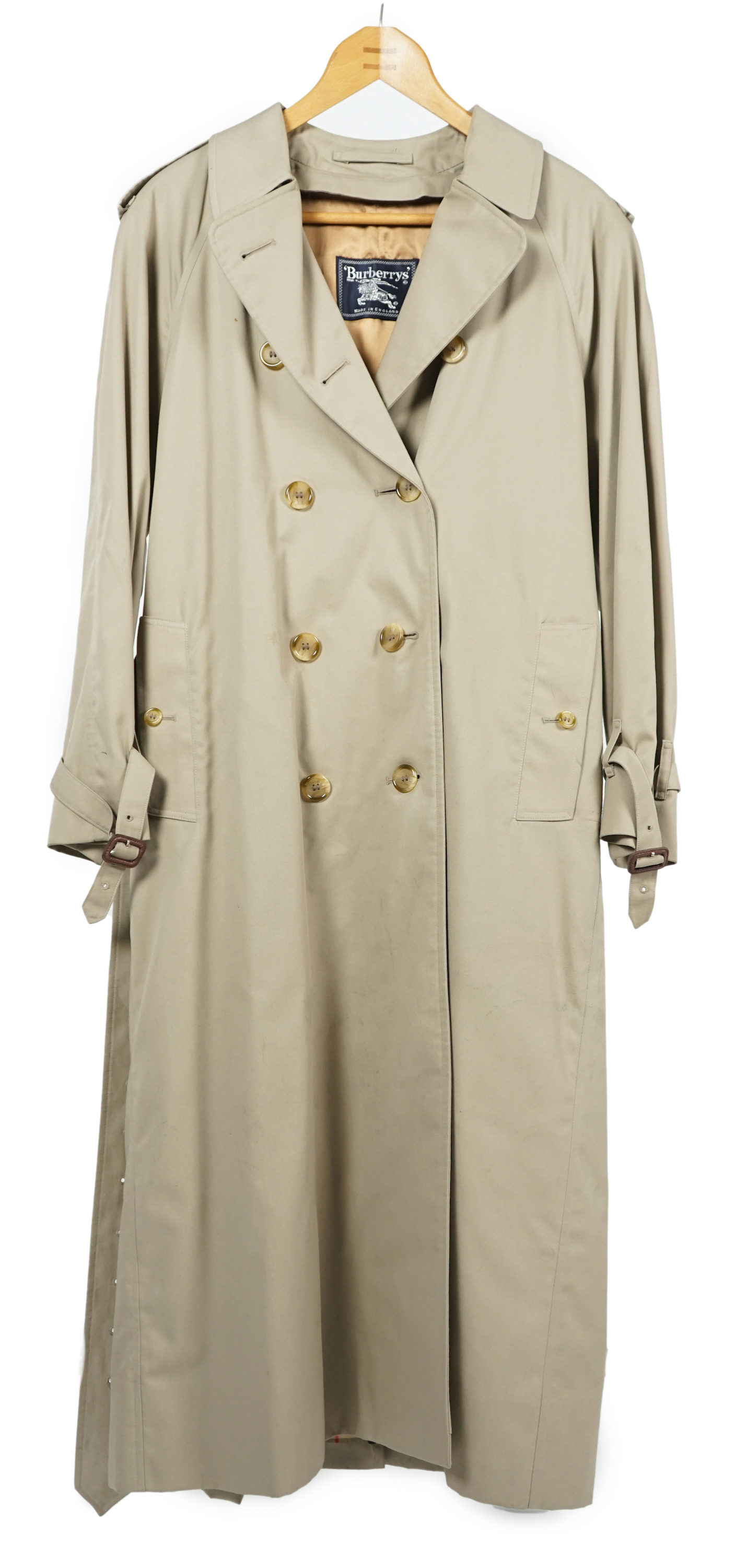 A lady's Burberry trench coat with padded detachable lining, size 12